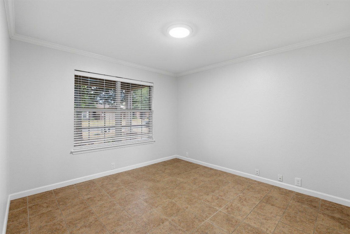 508 Lark Street Leander, TX 78641 - Photo 9 of 40 Another view of the formal dining area - a larger table would fit in here nicely as well. What you don't see to the right of the photo is an alcove leading to the kitchen.