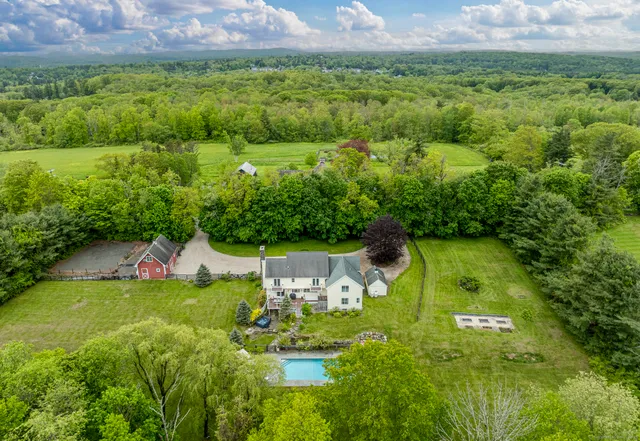 a view of a garden with an outdoor space