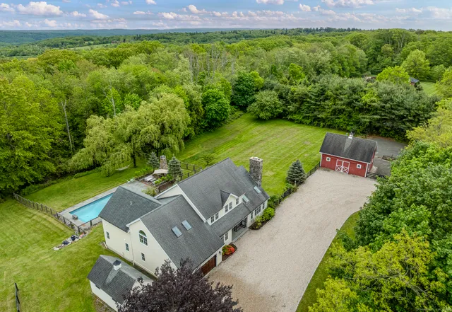 an aerial view of a house with garden