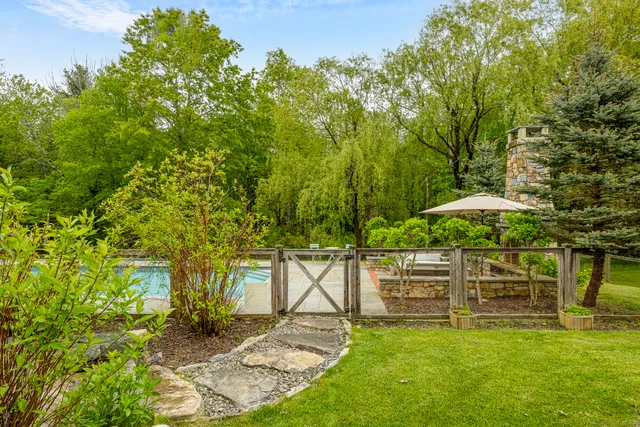 a view of a backyard with a garden