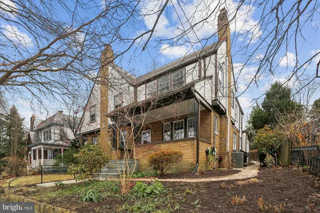 a outdoor space with patio the couches and a dining table with garden view