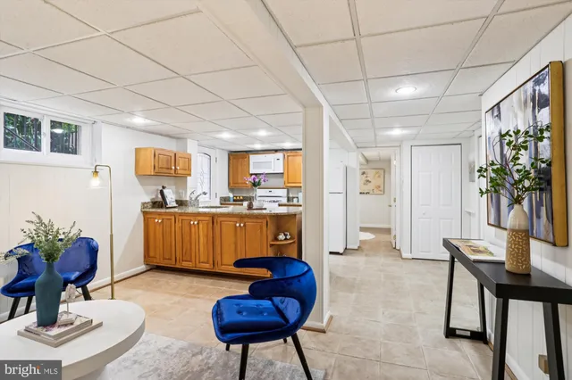 a bedroom with a bed and a mirror