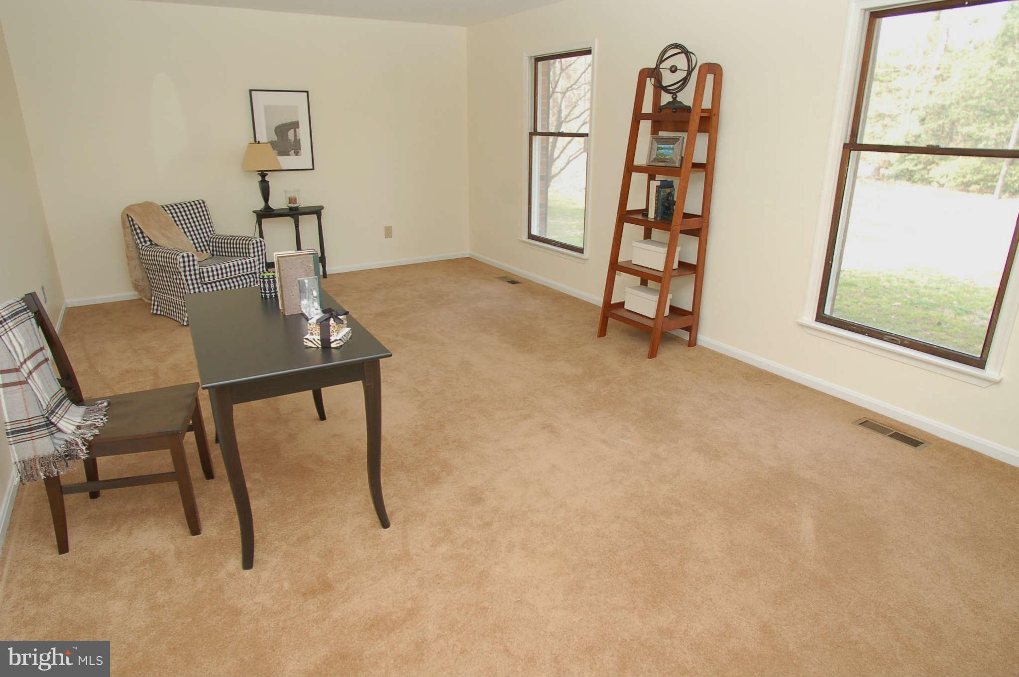 327 Magothy Bridge Road Pasadena, MD 21122 - Photo 14 of 30 a view of a room with furniture and wooden floor