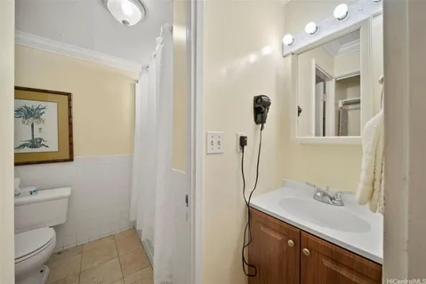 a view of balcony with wooden floor and rug