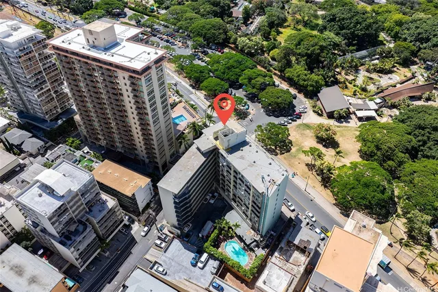 a bedroom with a large bed and a large window