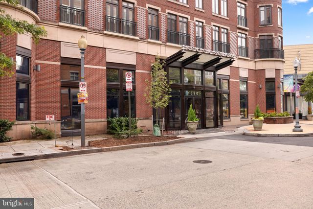 a view of a building on a street