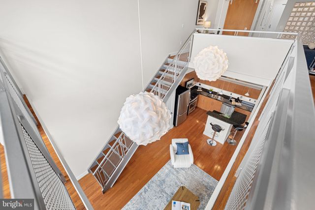 a room with furniture and wooden floor