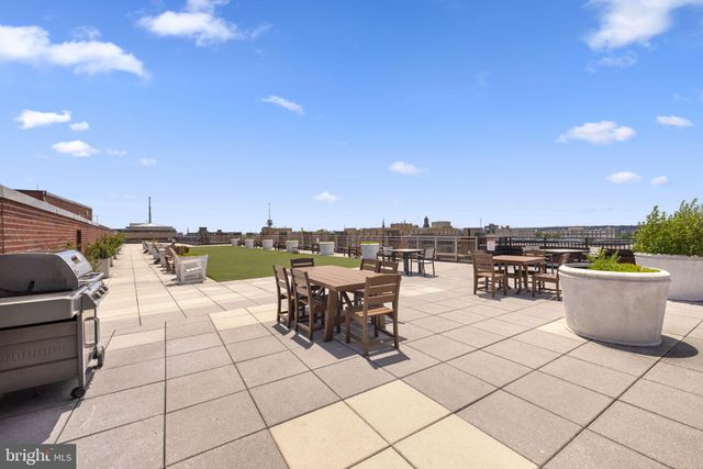 a view of a terrace with chairs