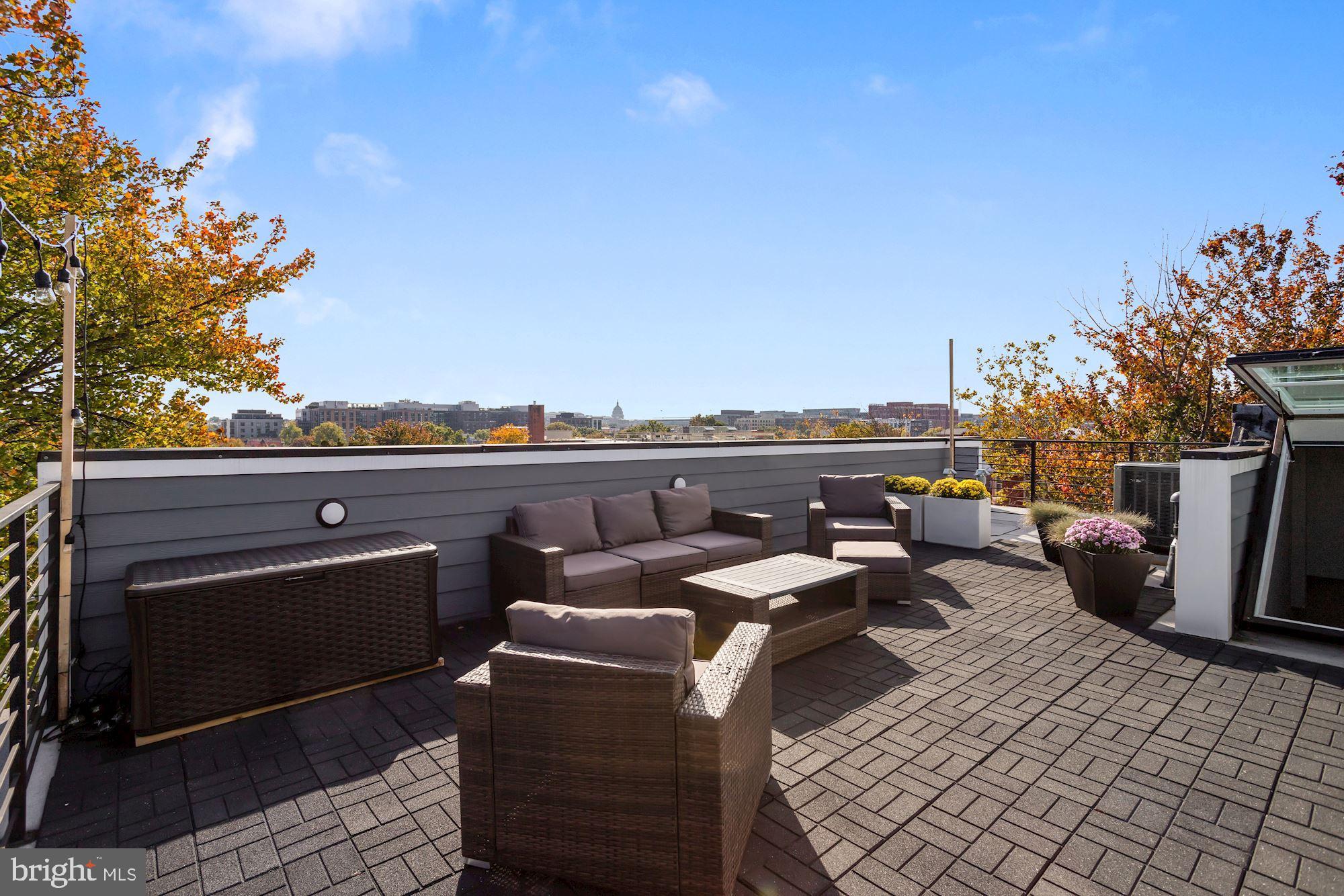 1105 7th Street Northeast, Unit 2 Washington, DC 20002 - Photo 1 of 33 Stunning Roof deck w/ 365 day Capitol/sunset view!