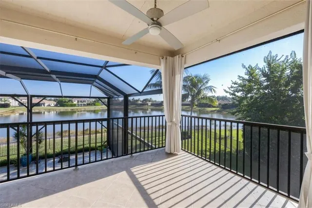 a view of a balcony with furniture