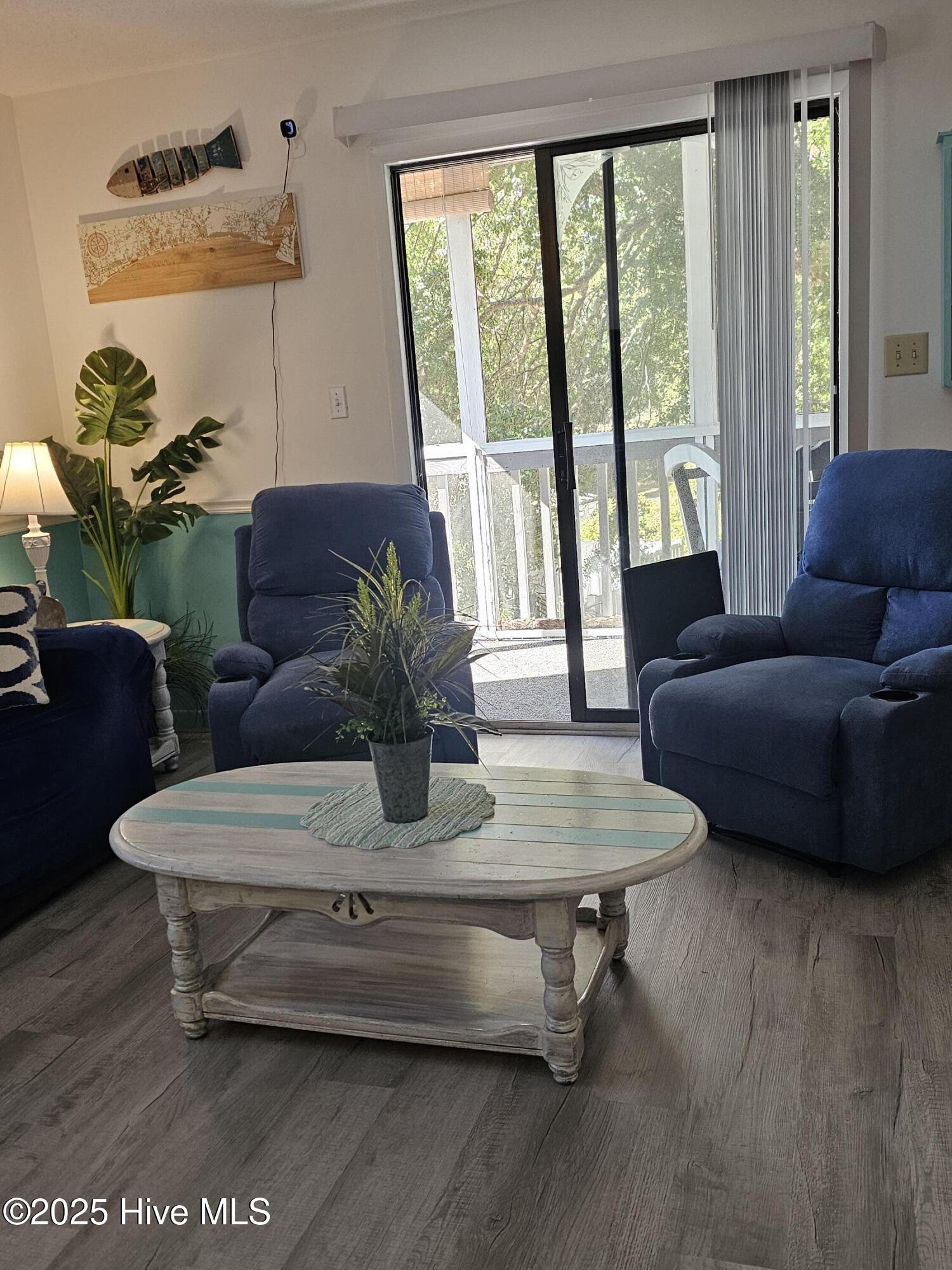 10172 Beach Drive Southwest, Unit 2206 Calabash, NC 28467 - Photo 8 of 53 Relax by Sliding Glass Doors