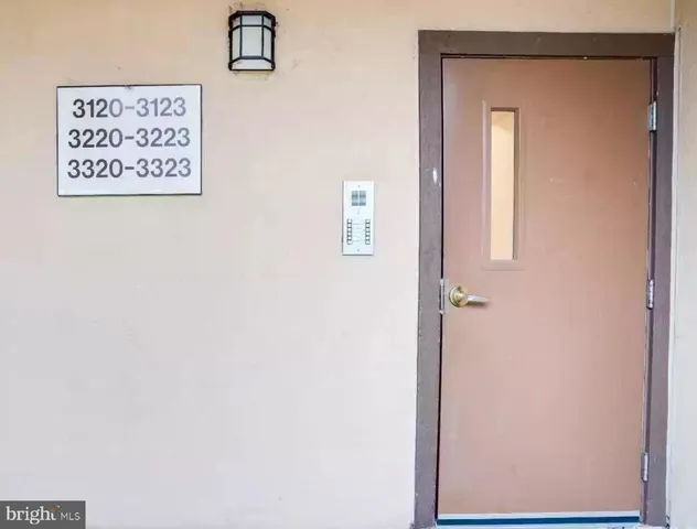 a view of a hallway with elevator