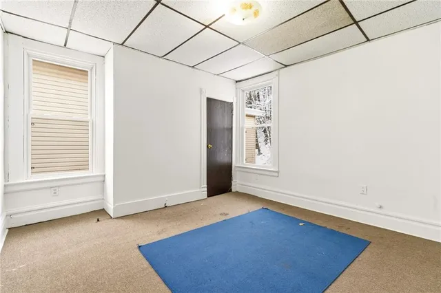 an empty room with windows