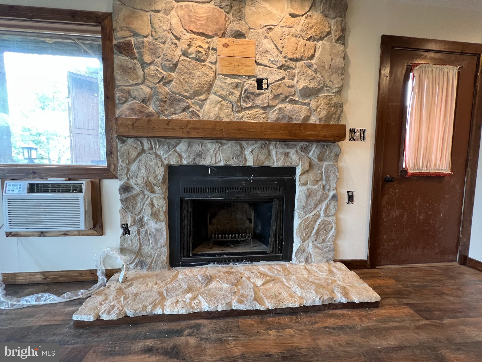 140 The Hill Road, Unit 21B Basye, VA 22810 - Photo 2 of 17 Native stone fireplace