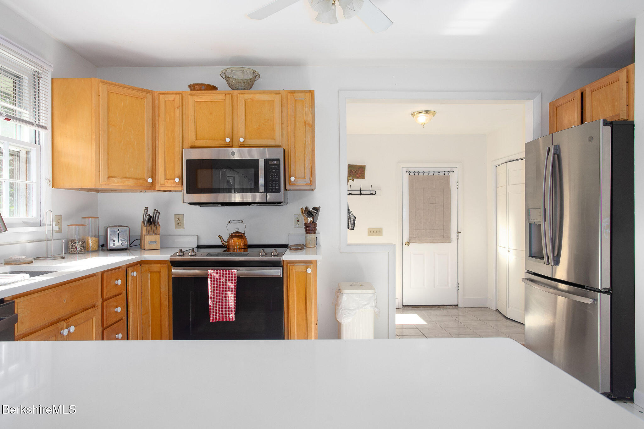 68 Creamery Road Egremont, MA 01230 - Photo 12 of 21 a kitchen with stainless steel appliances granite countertop a refrigerator a stove top oven a sink and dishwasher