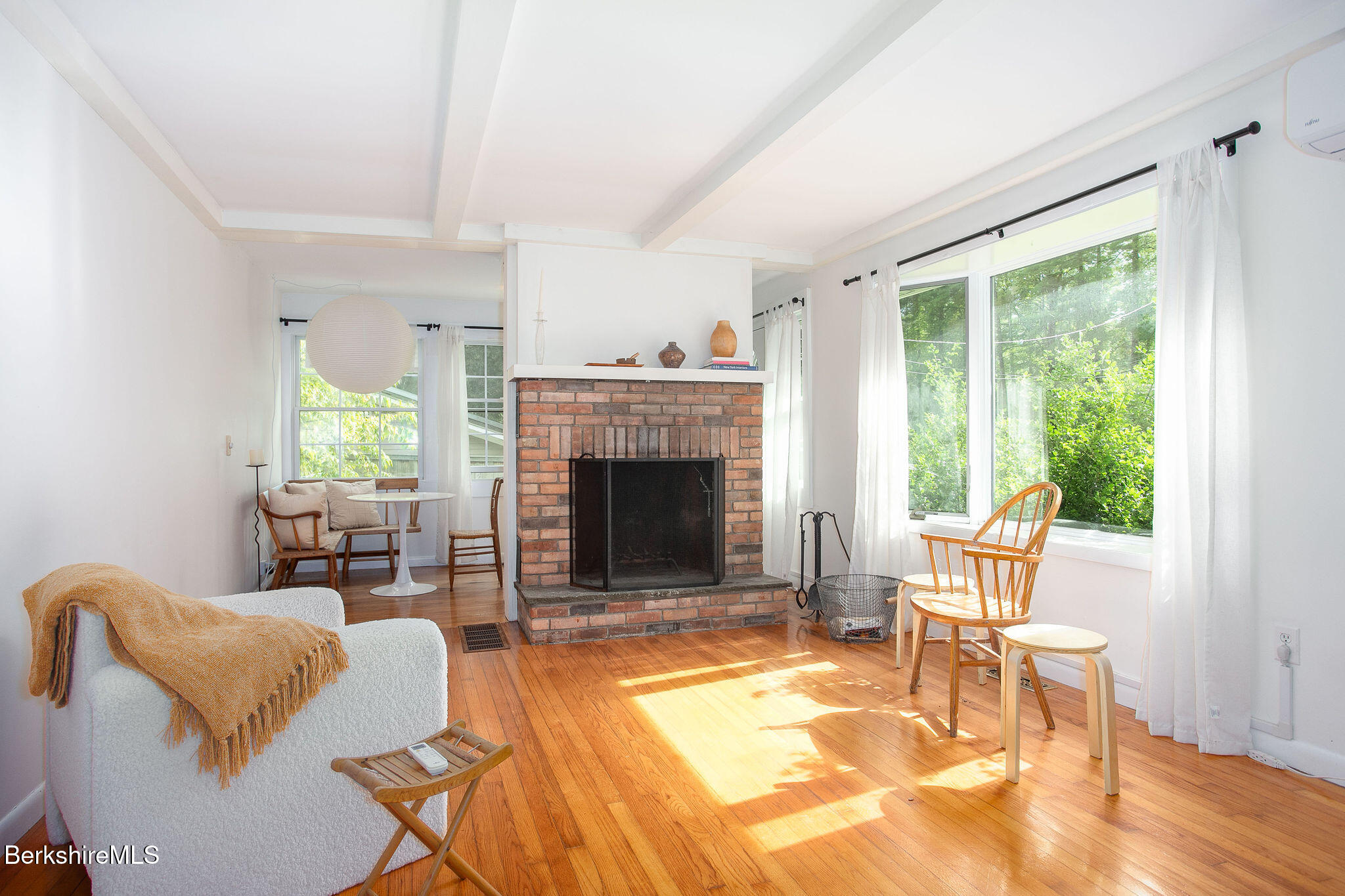 68 Creamery Road Egremont, MA 01230 - Photo 3 of 21 a living room with furniture and a fireplace