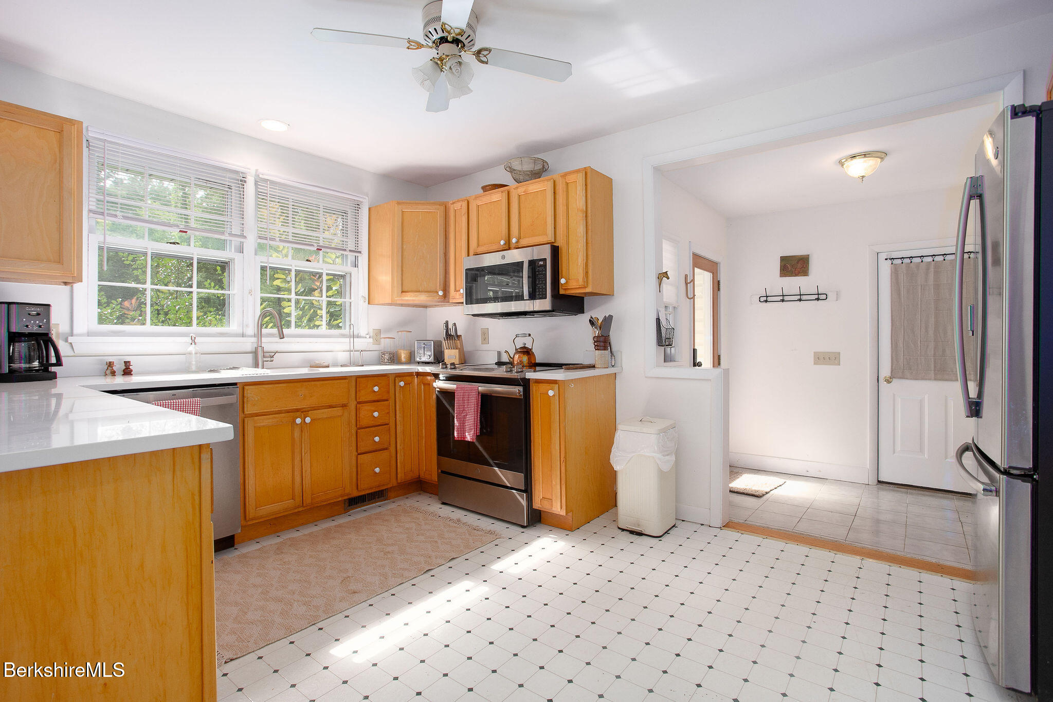 68 Creamery Road Egremont, MA 01230 - Photo 10 of 21 a kitchen with a sink a stove a refrigerator cabinets and a window