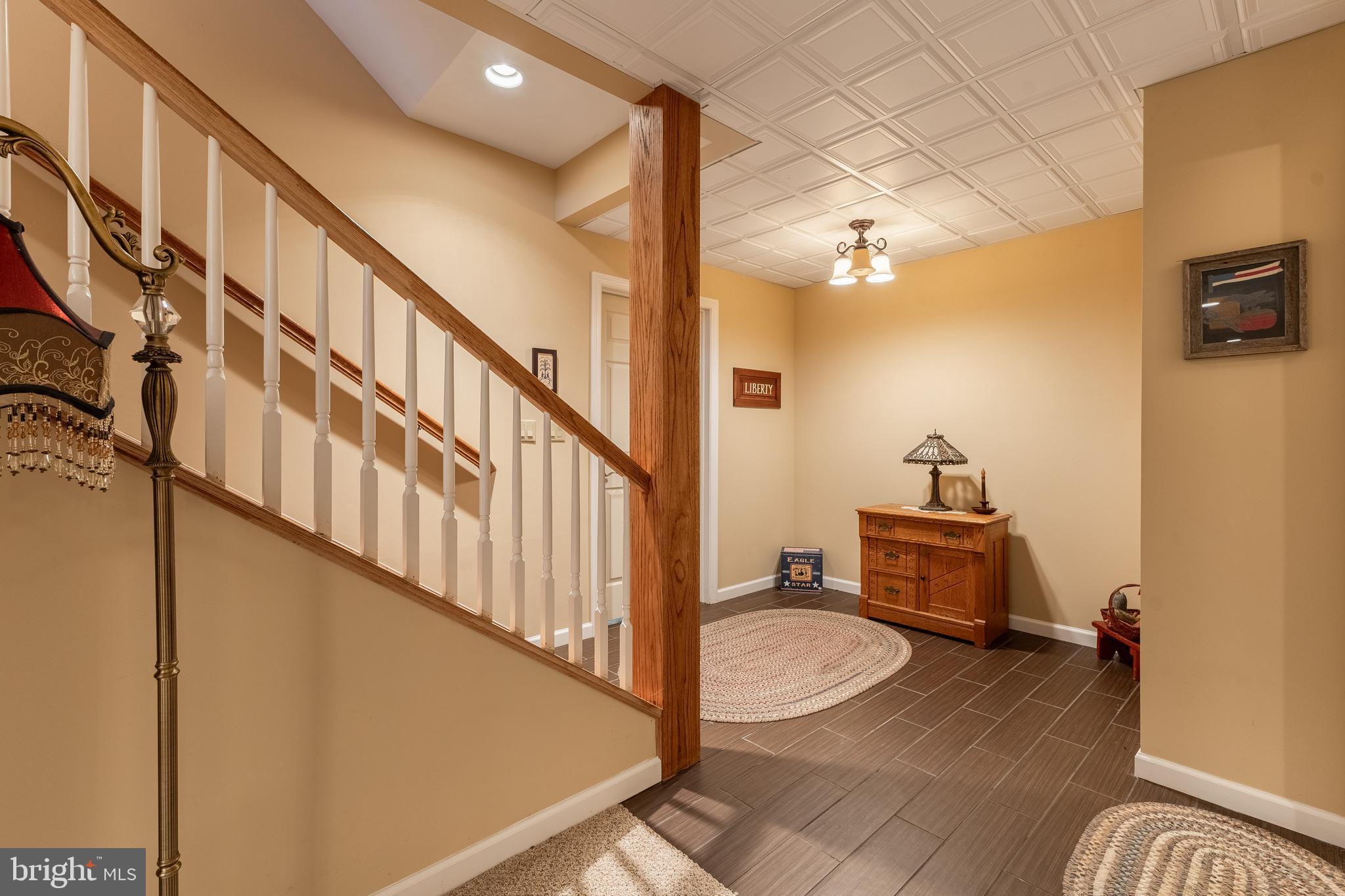 169 Quarry Street Bellefonte, PA 16823 - Photo 20 of 30 a view of a hallway with wooden floor and staircase
