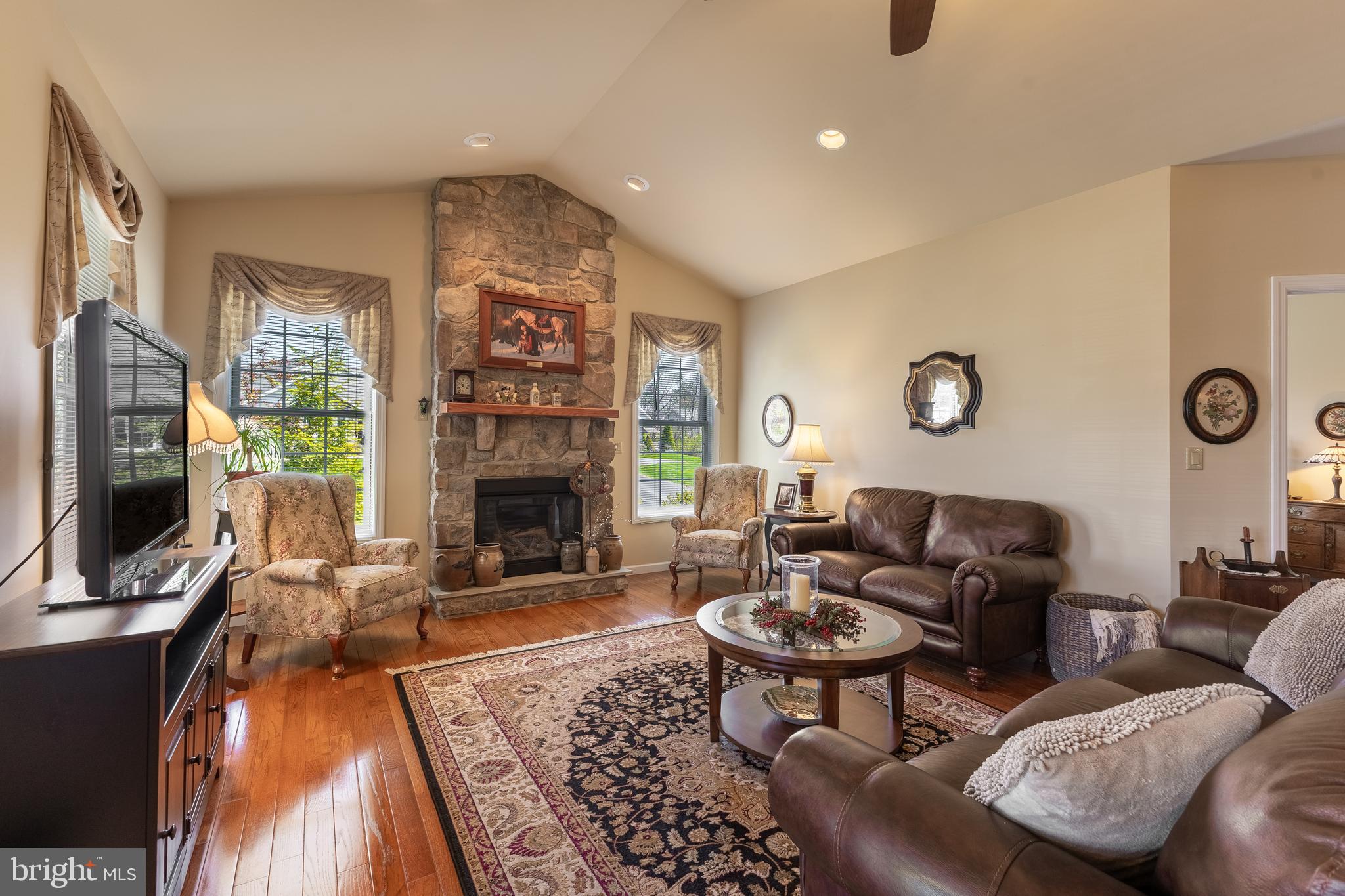 169 Quarry Street Bellefonte, PA 16823 - Photo 5 of 30 a living room with furniture and a flat screen tv