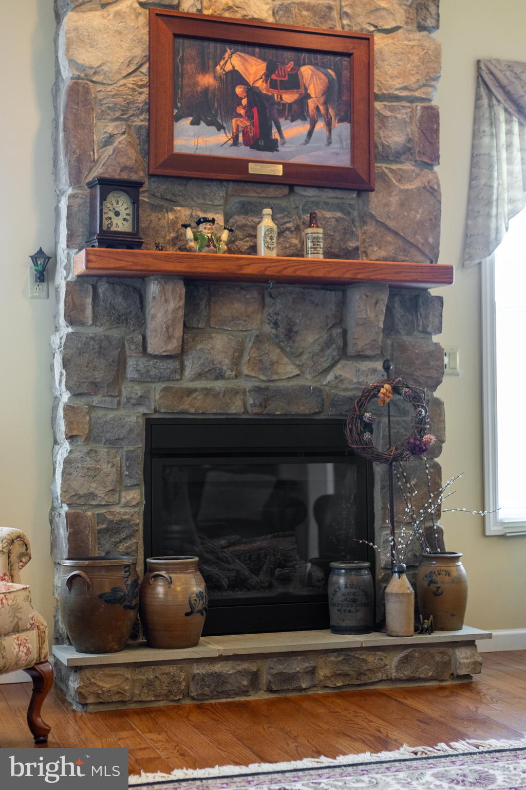 169 Quarry Street Bellefonte, PA 16823 - Photo 7 of 30 a fireplace with clock on top