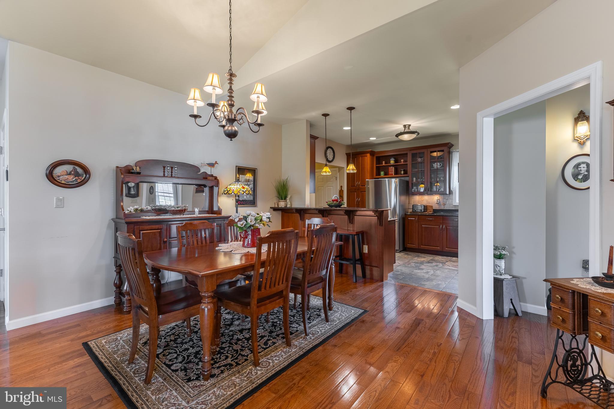 169 Quarry Street Bellefonte, PA 16823 - Photo 8 of 30 a view of a dining room with furniture and wooden floor