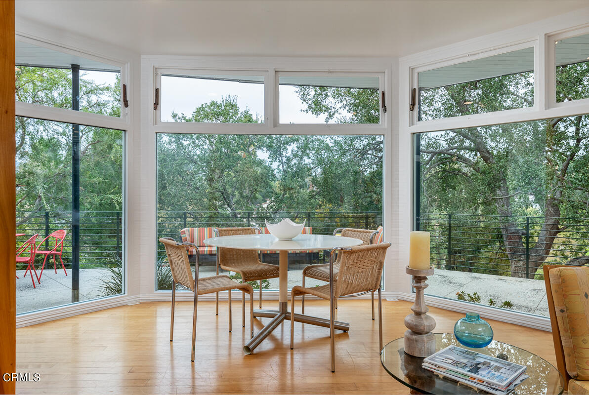 1707 Kaweah Drive Pasadena, CA 91105 - Photo 11 of 41 a view of a dining room with furniture window and wooden floor