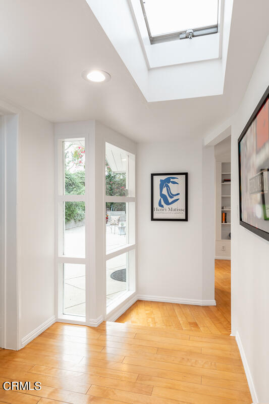1707 Kaweah Drive Pasadena, CA 91105 - Photo 15 of 41 a view of a big room with wooden floor and windows