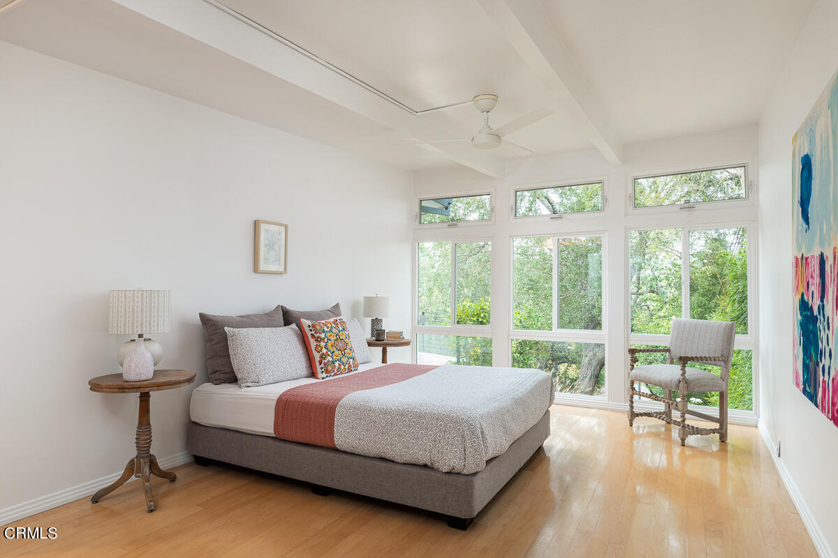 1707 Kaweah Drive Pasadena, CA 91105 - Photo 16 of 41 a bedroom with a bed and a large window