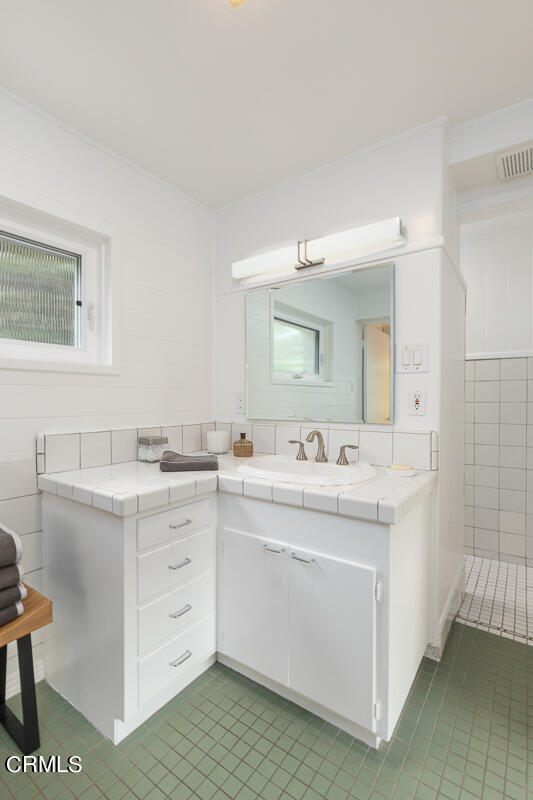 1707 Kaweah Drive Pasadena, CA 91105 - Photo 19 of 41 a room with a sink and a mirror