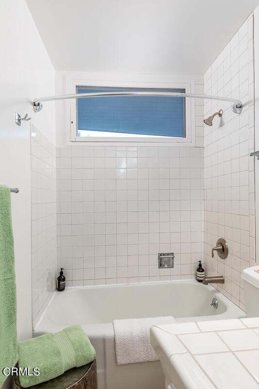1707 Kaweah Drive Pasadena, CA 91105 - Photo 27 of 41 a bathroom with a tub and a shower