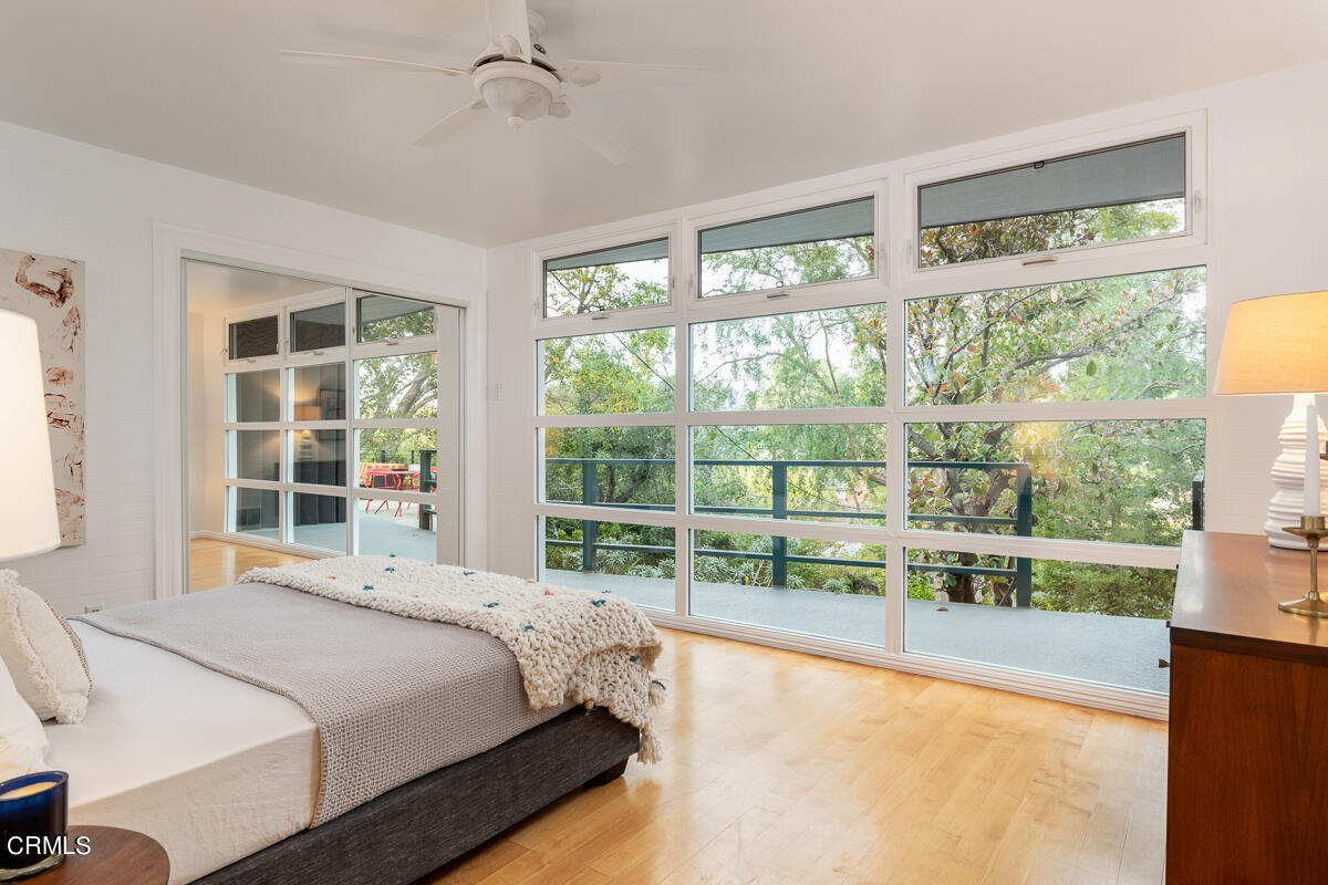 1707 Kaweah Drive Pasadena, CA 91105 - Photo 28 of 41 a bed sitting in a bedroom next to a large window