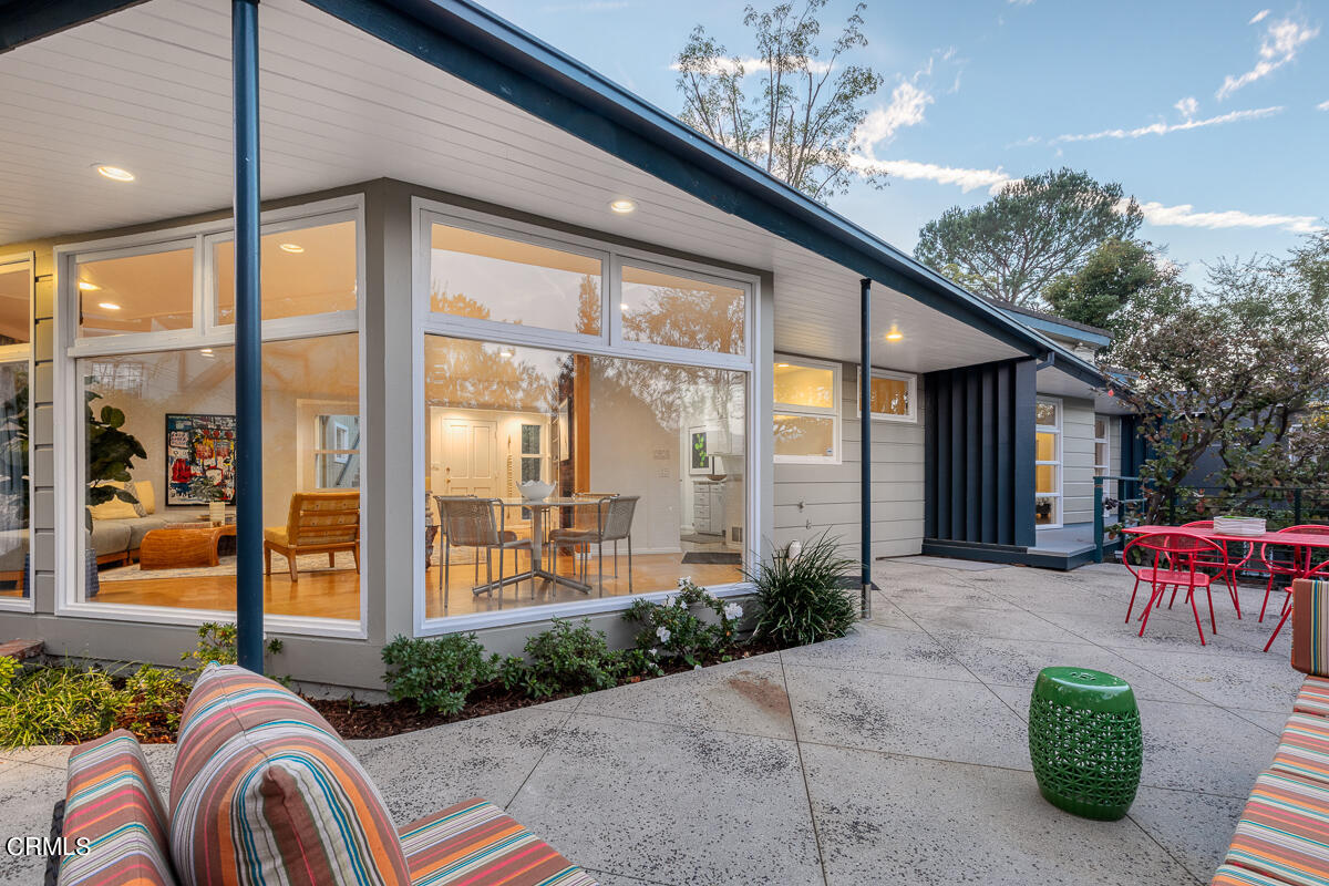 1707 Kaweah Drive Pasadena, CA 91105 - Photo 32 of 41 a house view with a seating space and swimming pool in front of it
