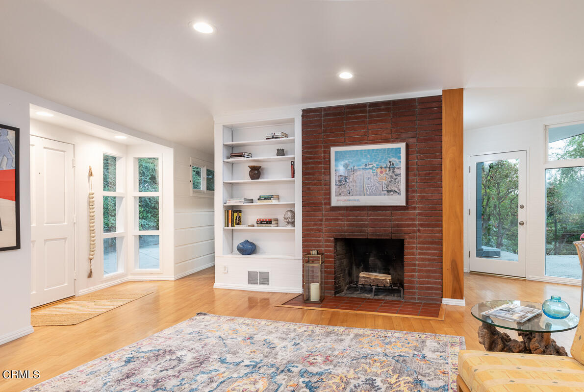1707 Kaweah Drive Pasadena, CA 91105 - Photo 7 of 41 a living room with furniture and a fireplace