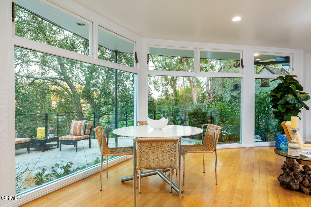 1707 Kaweah Drive Pasadena, CA 91105 - Photo 10 of 41 a view of a dining room with furniture water view and a garden
