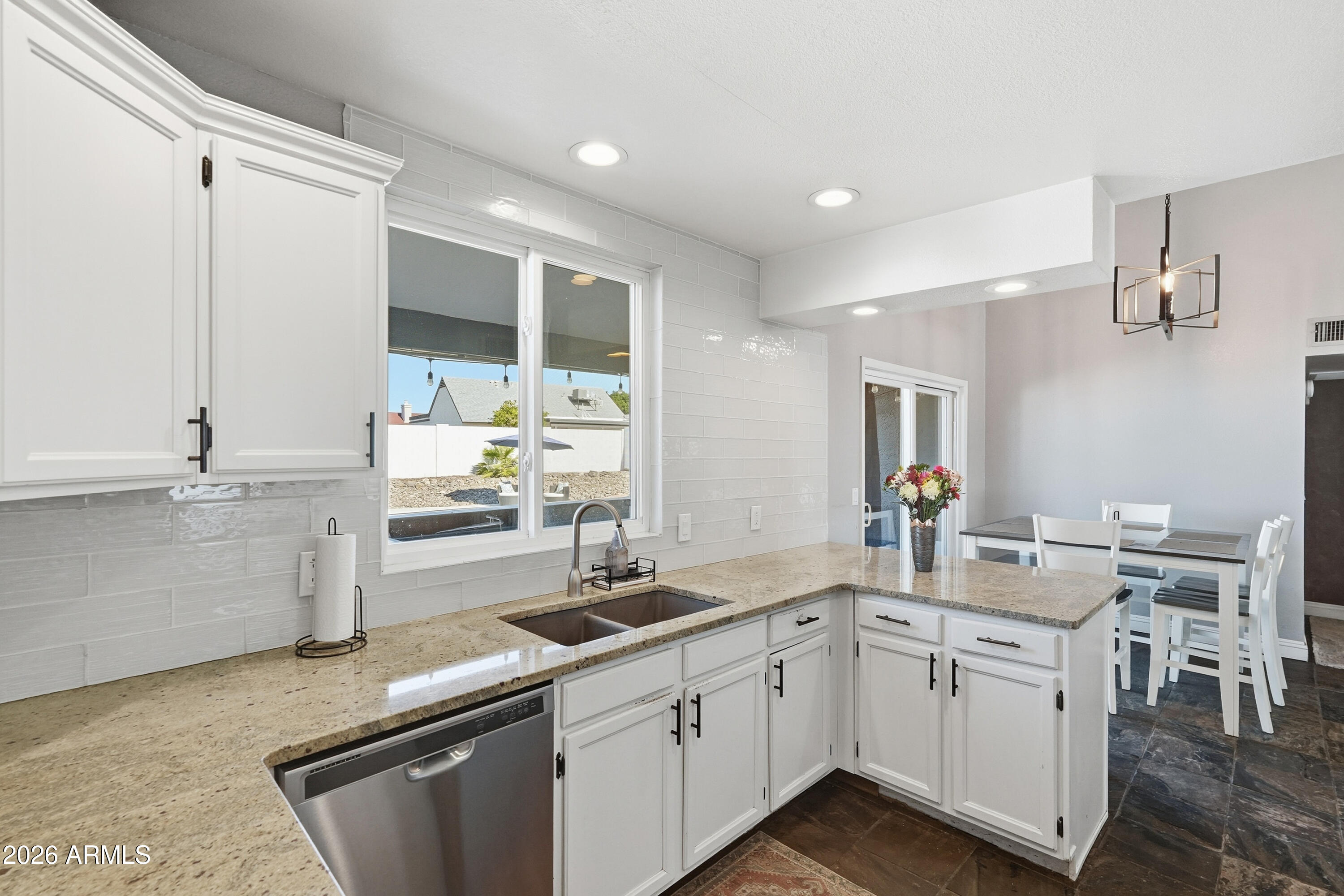 1314 East Utopia Road Phoenix, AZ 85024 - Photo 11 of 33 a kitchen with sink and cabinets