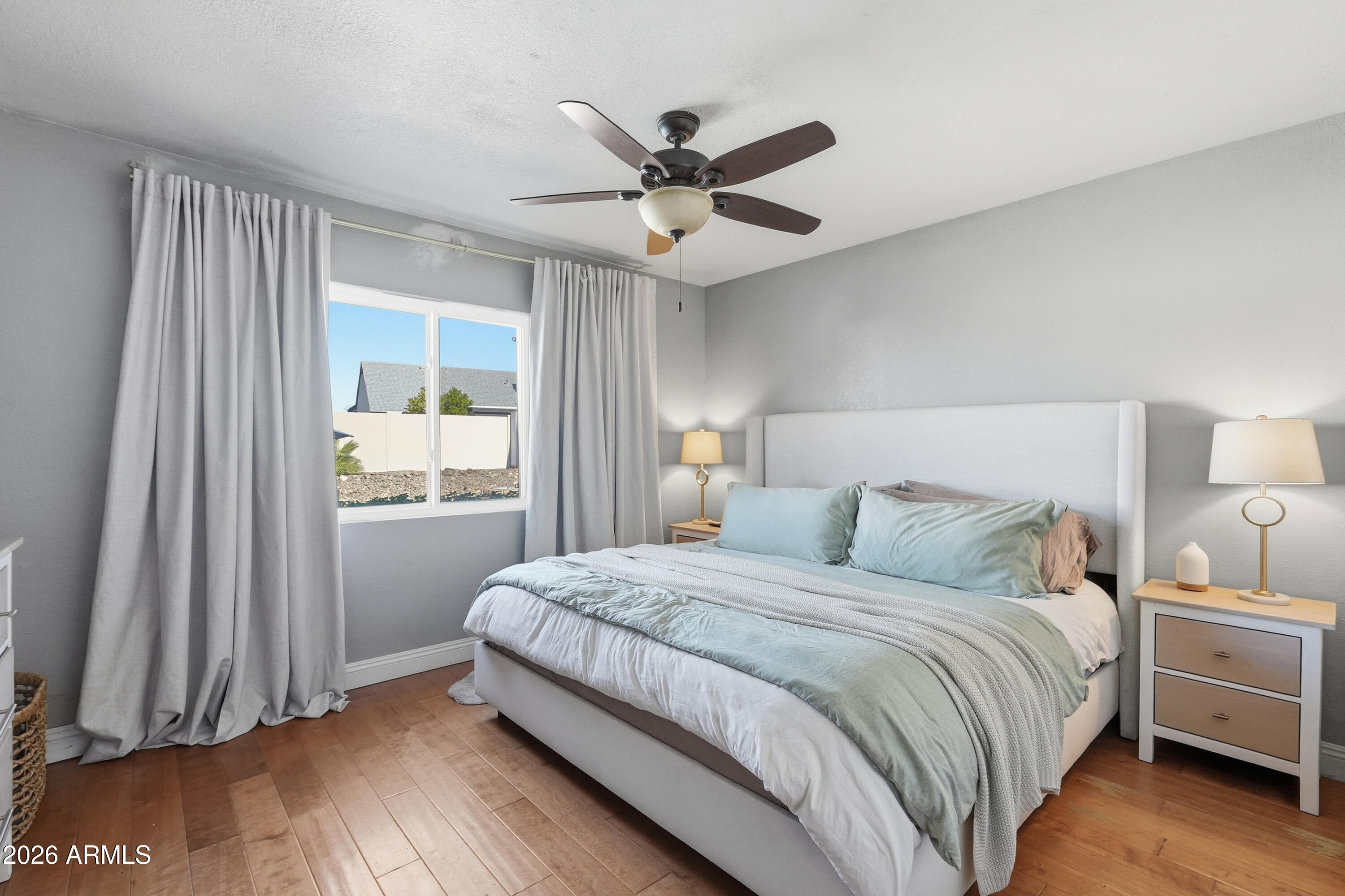 1314 East Utopia Road Phoenix, AZ 85024 - Photo 17 of 33 a bedroom with a bed and a window