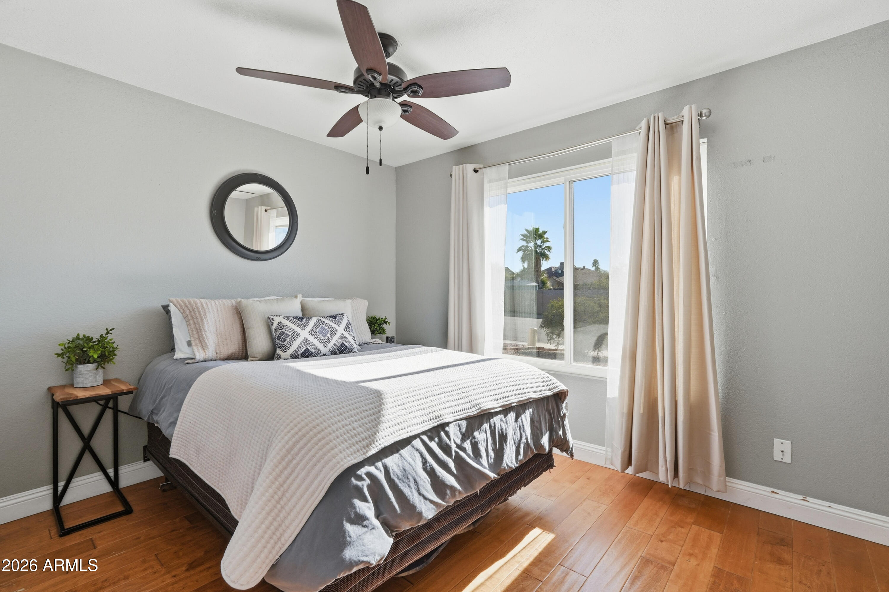 1314 East Utopia Road Phoenix, AZ 85024 - Photo 21 of 33 a bedroom with a bed and a window
