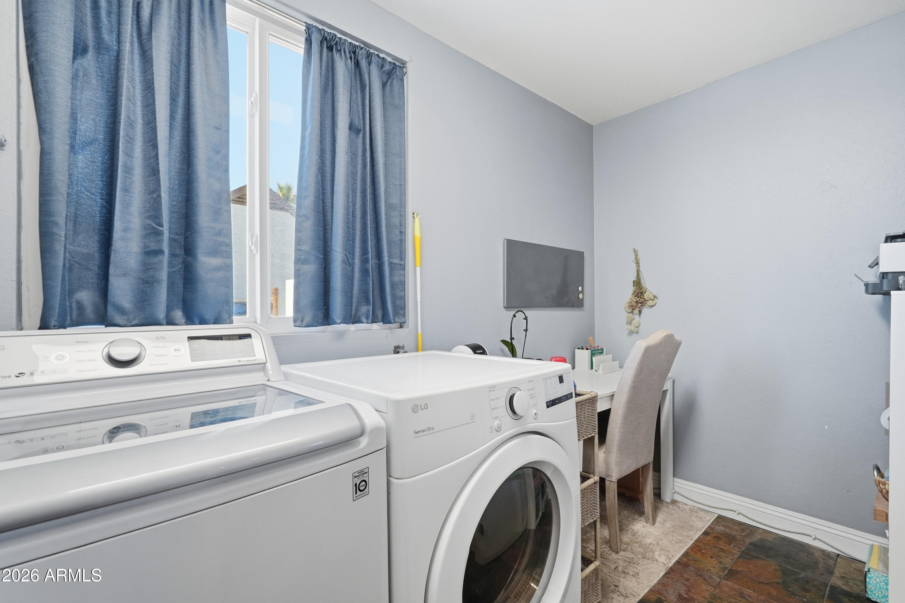 1314 East Utopia Road Phoenix, AZ 85024 - Photo 26 of 33 a utility room with dryer and washer