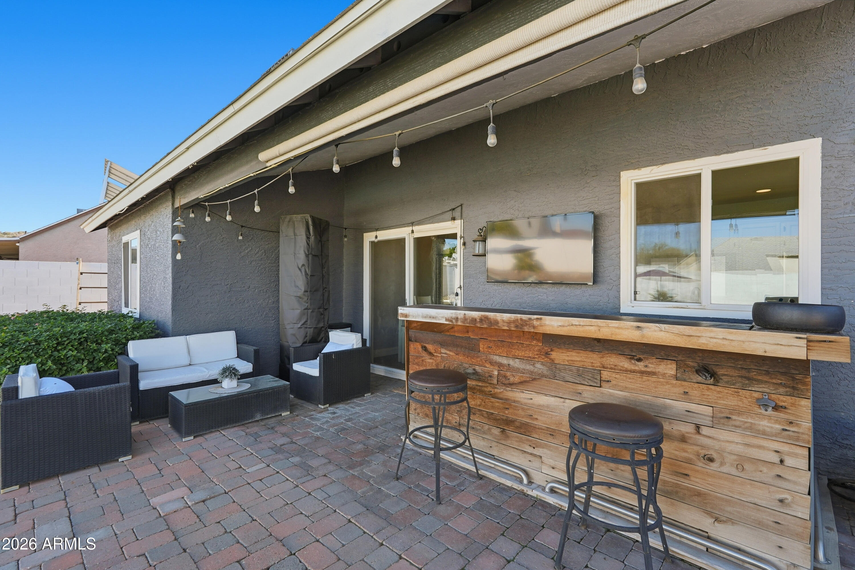 1314 East Utopia Road Phoenix, AZ 85024 - Photo 27 of 33 a outdoor space with a couch and chairs