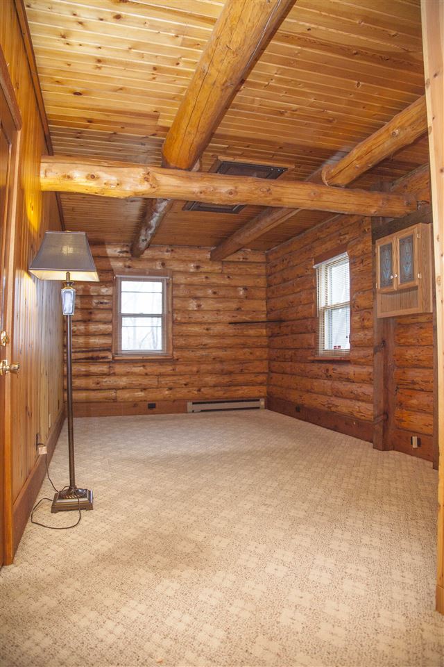 13026 West State Road Winnebago, IL 61088 - Photo 7 of 24 a view of a room with wooden walls