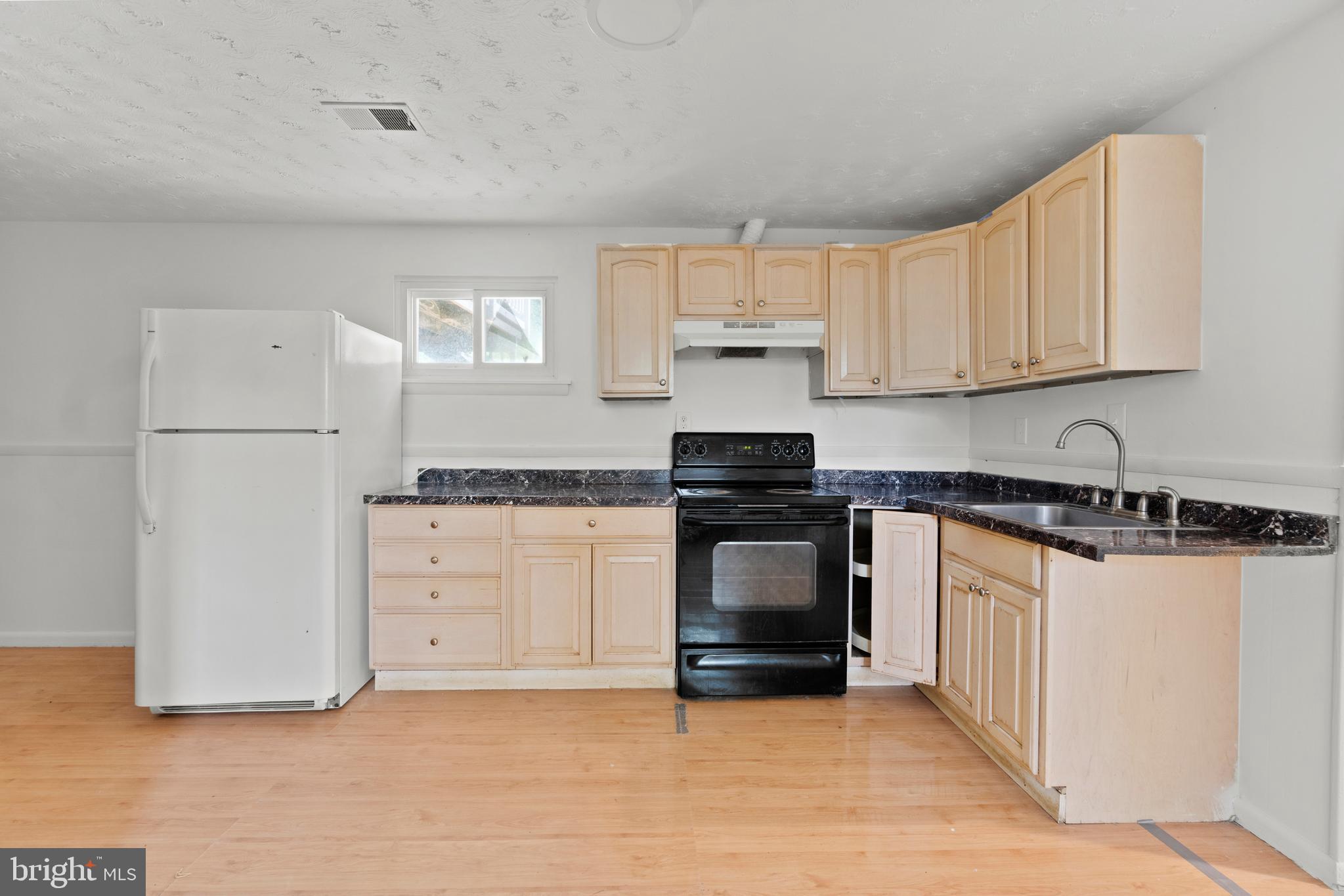 7908 Hart Road Fort Washington, MD 20744 - Photo 16 of 23 lower level kitchen