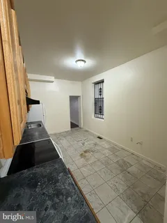 a view of a hallway view with staircase