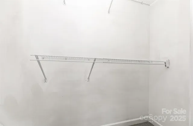 a view of small space with racks on the wall