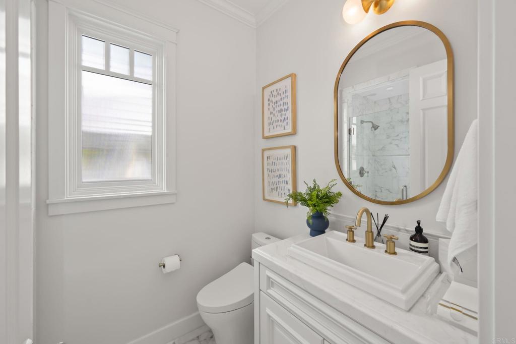 2211 Ocean Front Del Mar, CA 92014 - Photo 11 of 13 a bathroom with a sink and a mirror
