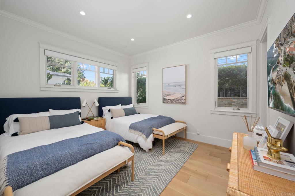 2211 Ocean Front Del Mar, CA 92014 - Photo 9 of 13 a bedroom with furniture and a window