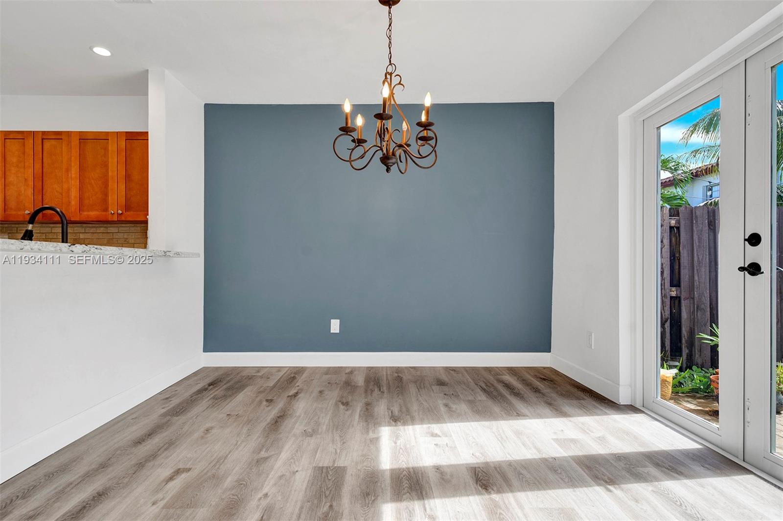 20985 Southwest 84th Avenue Cutler Bay, FL 33189 - Photo 10 of 36 a view of a livingroom with wooden floor