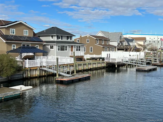 a view of houses with a lake view