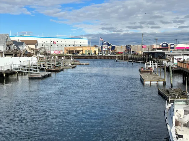 a view of swimming pool with outdoor seating