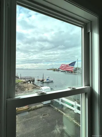 a view of a balcony with an ocean view