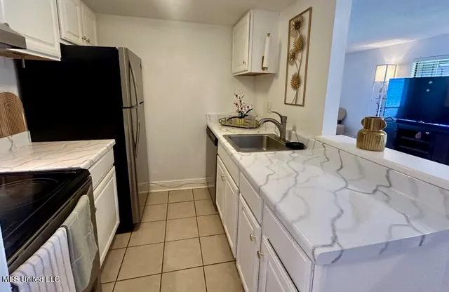 $97,900 | 209 Molokai, Unit C, Diamondhead, MS 39525